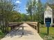 Long Creek Greenway bridge offers scenic views and access to walking trails and outdoor activities at 8707 Copenhagen Ln, Charlotte, NC 28216