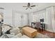 Upstairs open office area with hardwood floors and bright windows offers a comfortable workspace at 8707 Copenhagen Ln, Charlotte, NC 28216