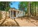 Outdoor storage shed on a wooded lot at 8707 Copenhagen Ln, Charlotte, NC 28216