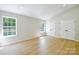 Spacious bedroom with hardwood floors, natural light and double-door closets at 8811 Steelechase Dr, Charlotte, NC 28273