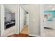Hallway featuring views into the bathroom and two bedrooms at 8929 Lizzie Ln, Huntersville, NC 28078