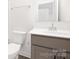 A well-lit bathroom featuring a large vanity, toilet, and clean, neutral design at 908 Cypress Point Ln # 218, Monroe, NC 28112