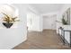 Bright entryway featuring hardwood floors, modern decor, and an open floor plan at 908 Cypress Point Ln # 218, Monroe, NC 28112