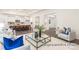 Inviting living room with an open layout, a glass coffee table, and stylish furniture for a relaxed ambiance at 908 Cypress Point Ln # 218, Monroe, NC 28112