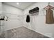 Walk-in closet with wire shelving providing ample storage space, and gray carpet at 920 Exeter Dr, Sherrills Ford, NC 28673