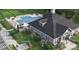 Aerial view of the community pool and recreation area, featuring a pool, tennis court, and clubhouse at 920 Exeter Dr, Sherrills Ford, NC 28673
