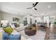 Bright living room features modern furnishings, neutral walls, and open floorplan overlooking dining area and kitchen at 920 Exeter Dr, Sherrills Ford, NC 28673