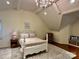 Charming bedroom with vaulted ceiling, chandelier, hardwood floors, and cozy sitting nook with storage at 9508 Hayenridge Ct, Huntersville, NC 28078