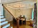 Formal dining room featuring decorative chandelier and tray ceiling adds a touch of elegance to the home at 9508 Hayenridge Ct, Huntersville, NC 28078