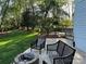 Cozy backyard patio with stone fire pit and comfortable seating at 9508 Hayenridge Ct, Huntersville, NC 28078