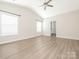 Bright bedroom with lots of natural light and neutral finishes at 105 Tanner Loop, Troutman, NC 28166