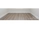 Neutral room showcasing new vinyl plank flooring and trim at 105 Tanner Loop, Troutman, NC 28166