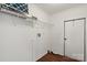 Well-organized laundry room features shelving, ensuring a tidy and efficient space at 1058 Canada Dr, Dallas, NC 28034