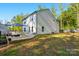 Spacious backyard features a patio seating area, perfect for outdoor entertaining at 11040 E Lake Rd, Charlotte, NC 28215