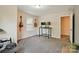 Sunlit bedroom space perfect for music or office setup, creating a versatile and inviting room at 11040 E Lake Rd, Charlotte, NC 28215