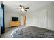 Cozy bedroom featuring a large dresser and closet, offering ample storage space for your belongings at 11040 E Lake Rd, Charlotte, NC 28215