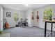 Versatile bedroom with natural light, perfect for a music room or customizable living space at 11040 E Lake Rd, Charlotte, NC 28215