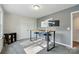 Bright bedroom or office featuring modern desk setup, offering a functional and stylish workspace at 11040 E Lake Rd, Charlotte, NC 28215
