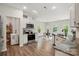 Open kitchen with an island, stainless steel appliances and a view into dining area at 11040 E Lake Rd, Charlotte, NC 28215