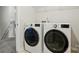Well-equipped laundry room with modern washer and dryer units, making laundry chores a breeze at 11040 E Lake Rd, Charlotte, NC 28215