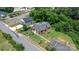 Aerial view of brick home showing layout, landscaping, and surrounding neighborhood at 115 12Th Sw St, Hickory, NC 28602