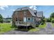 Home backyard featuring a deck and showcasing the home's exterior architecture and setting at 115 12Th Sw St, Hickory, NC 28602