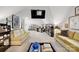 Spacious bonus room features a home theater, a desk area, and multiple comfortable seating areas at 115 12Th Sw St, Hickory, NC 28602