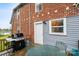 Outdoor deck with a grill and seating, ideal for entertaining and enjoying outdoor meals at 115 12Th Sw St, Hickory, NC 28602