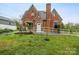 Charming brick home featuring a ramp to the front door and a well-manicured lawn at 115 12Th Sw St, Hickory, NC 28602
