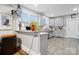Modern kitchen with grey cabinets, marble countertops, and stainless steel appliances at 115 12Th Sw St, Hickory, NC 28602