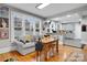 Inviting living room with hardwood floors, bright windows, comfortable seating, and kitchen view at 115 12Th Sw St, Hickory, NC 28602
