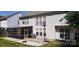 Spacious backyard features a screened-in porch, patio, basketball hoop, and lush green lawn for outdoor activities at 119 W Maranta Rd, Mooresville, NC 28117
