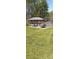 Lakefront property features a covered dock with multiple kayaks for outdoor water adventures and relaxation at 119 W Maranta Rd, Mooresville, NC 28117