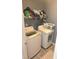 Efficient laundry room features a washer and dryer and ample storage space at 119 W Maranta Rd, Mooresville, NC 28117