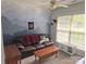 Comfortable living room featuring mountain mural and cozy furnishings at 119 W Maranta Rd, Mooresville, NC 28117