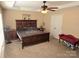 Spacious bedroom with a ceiling fan, carpet flooring, and ample natural light at 119 W Maranta Rd, Mooresville, NC 28117