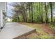 Backyard featuring a large concrete patio at 1213 Salvadore Ct, Gastonia, NC 28052