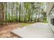 Backyard featuring a large concrete patio at 1213 Salvadore Ct, Gastonia, NC 28052
