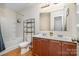 Bathroom with double sinks and a tub with shower at 1213 Salvadore Ct, Gastonia, NC 28052
