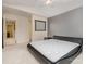 Vaulted ceiling bedroom with a large mirror on the wall and a black bed frame at 1213 Salvadore Ct, Gastonia, NC 28052
