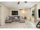 Comfortable living room with cozy seating, large window, and stylish tile flooring at 1213 Salvadore Ct, Gastonia, NC 28052