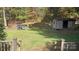 Large backyard with a shed, chicken coop and beautiful fall foliage at 124 Riley Rd, Dallas, NC 28034