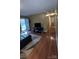 Entryway with hardwood floors, an adjacent living room, and a view of the backyard at 124 Riley Rd, Dallas, NC 28034