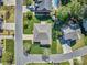 An aerial view shows a home with well-manicured lawns, mature trees, and a neatly designed landscape at 133 Misty Woods Dr, Lake Wylie, SC 29710