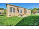 The backyard features a brick home, with a well-maintained lawn, ideal for recreation at 133 Misty Woods Dr, Lake Wylie, SC 29710