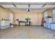 Spacious two-car garage with painted floors and ample storage room at 133 Misty Woods Dr, Lake Wylie, SC 29710