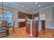 This kitchen features stainless steel appliances and stylish wooden cabinets at 133 Misty Woods Dr, Lake Wylie, SC 29710