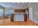 Well-appointed kitchen with custom cabinets, stainless appliances, and an island with seating at 133 Misty Woods Dr, Lake Wylie, SC 29710
