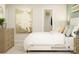 Comfortable bedroom featuring a plush bed, dresser, and artwork; designed for relaxation and style at 1552 Croydon St, Indian Land, SC 29707