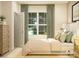 Cozy bedroom boasts natural light with a large window, complemented by a classic dresser and comfortable bed at 1552 Croydon St, Indian Land, SC 29707